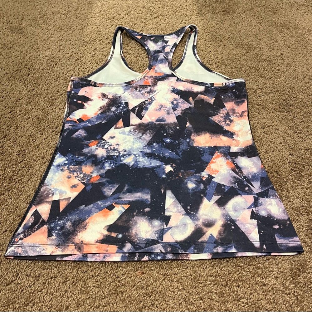 Purple, Pink/Orange/Salmon, White, and Black Galaxy Patterned Actra Tank Top - Picture 2 of 3